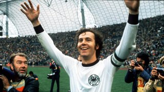 Beckenbauer celebrates beating Holland in the 1974 World Cup final in Germany