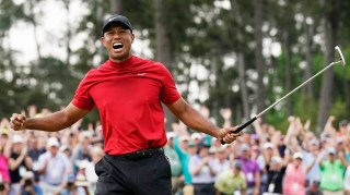 Woods has traditionally worn his iconic red shirt on a Sunday as his mother described it as his “power colour”