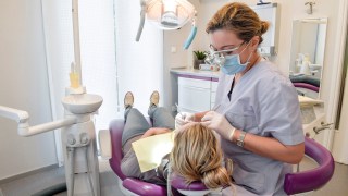 Dentists are struggling with a backlog that buil up during the pandemic